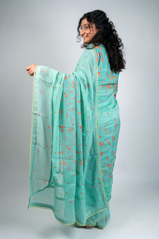 Aqua green Chanderi saree with peach floral prints