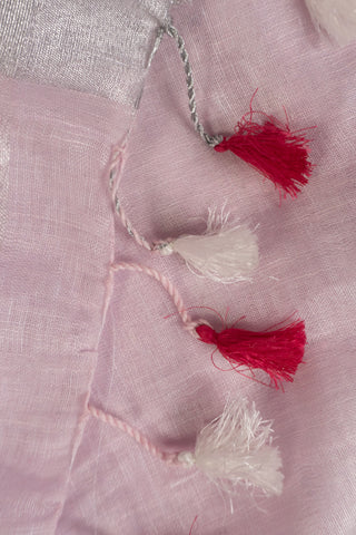 Pink linen saree with magenta border and tassels