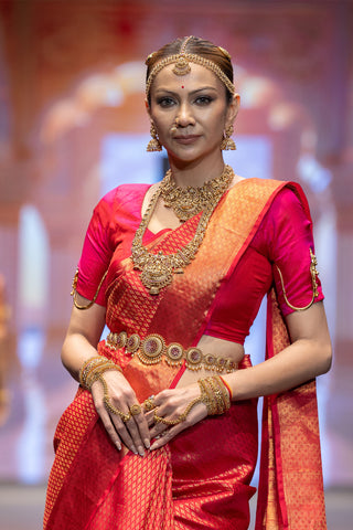 Crimson red Kanjivaram silk saree with Vanamasingaram zari border