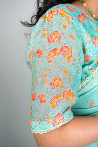 Aqua green Chanderi saree with peach floral prints