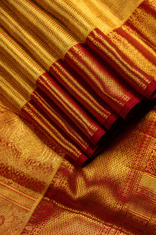 Gold Tissue Kanjivaram Saree with red contrast border
