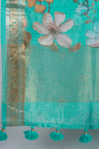 seafoam green soft linen tissue saree with digital floral prints and flamingo motifs handcrafted saree from Madhurya	