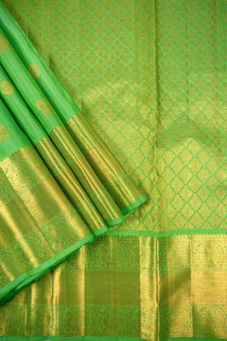 Peridot Green Kanjivaram Silk Saree with Peacock and Rudraksh Zari Motifs handwoven saree