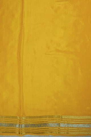 Off-white crepe silk saree with gold zari checks, mustard yellow paisley border and striped mustard pallu