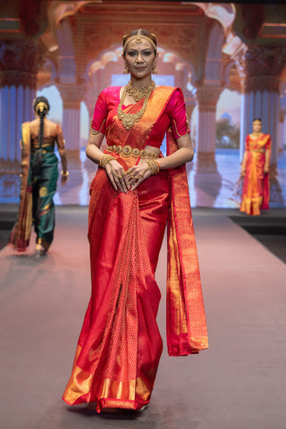 Crimson red Kanjivaram silk saree with Vanamasingaram zari border