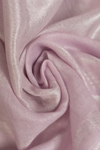 Pink linen saree with magenta border and tassels