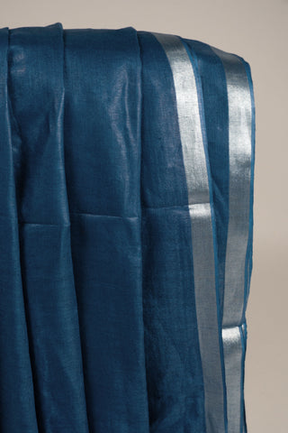 blue pure tissue linen saree with gold zari stripes and geometric pallu handcrafted saree from Madhurya