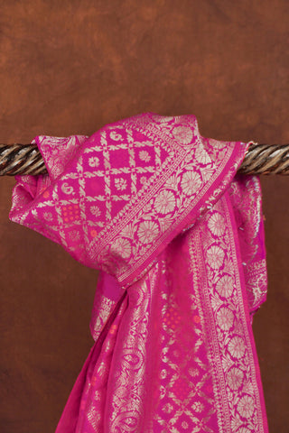 Magenta pink Banarasi jacquard dupatta with diagonal gold zari leheriya, orange meenakari accents and tree-of-life pallu