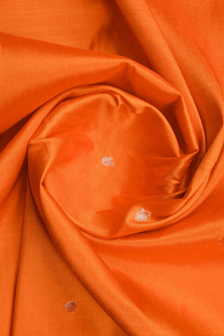 Orange Paithani silk saree with gold dot buttis and a lotus border, with red, purple and green tissue pallu