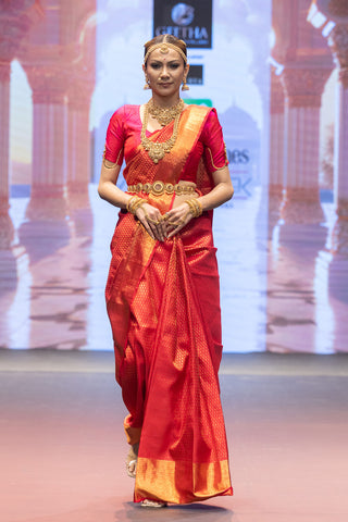 Crimson red Kanjivaram silk saree with Vanamasingaram zari border