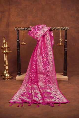 Magenta pink Banarasi jacquard dupatta with diagonal gold zari leheriya, orange meenakari accents and tree-of-life pallu