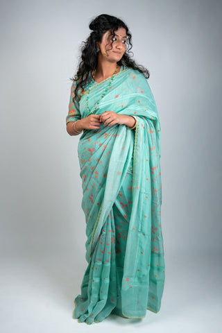 Aqua green Chanderi saree with peach floral prints
