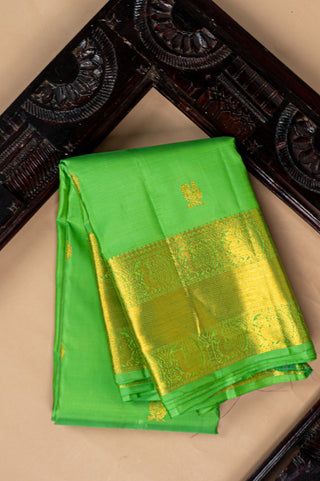 Peridot Green Kanjivaram Silk Saree with Peacock and Rudraksh Zari Motifs handwoven saree