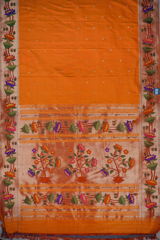 Orange Paithani silk saree with gold dot buttis and a lotus border, with red, purple and green tissue pallu