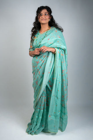 Aqua green Chanderi saree with peach floral prints