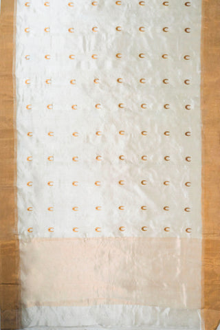 Off-white silk cotton Chanderi saree with gold zari chand motifs and red meenakari accents