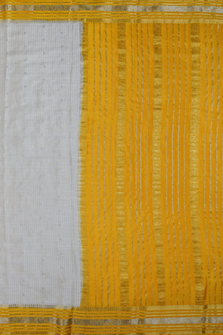 Off-white crepe silk saree with gold zari checks, mustard yellow paisley border and striped mustard pallu