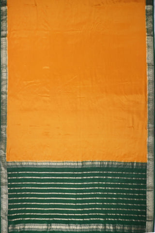 Mustard yellow silk saree with a bottle green border woven in gold zari floral and leaf motifs, striped pallu