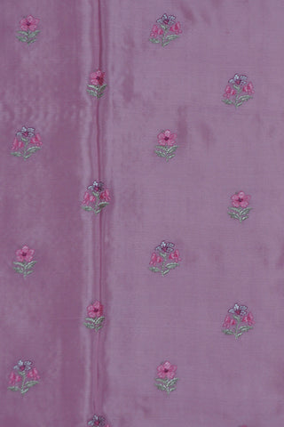 Magenta pink crepe silk saree with gold zari checks and pink-green floral thread embroidery on the pallu