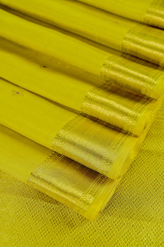Yellow Kanjivaram Silk Saree with Purple Floral Buttas and Gold Zari Border