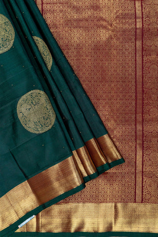 Bottle green Kanjivaram silk saree with gold zari border