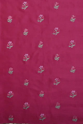 Lilac crepe silk saree with gold zari checks and pink, white and green floral vine embroidery on the borders