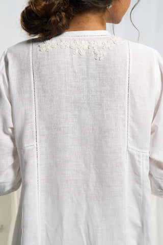 Ethereal white kurta with embroidered neckline and sleeves