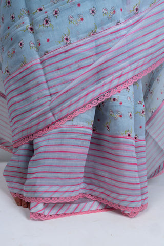 Pale blue Chanderi saree with pink striped border