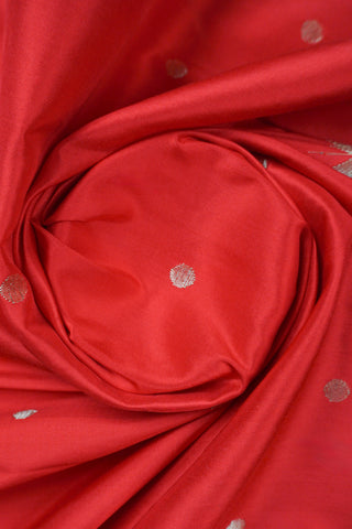 Red Paithani silk saree with gold buttis, tissue Muniya border and a pallu of parrots and peacocks on a tree