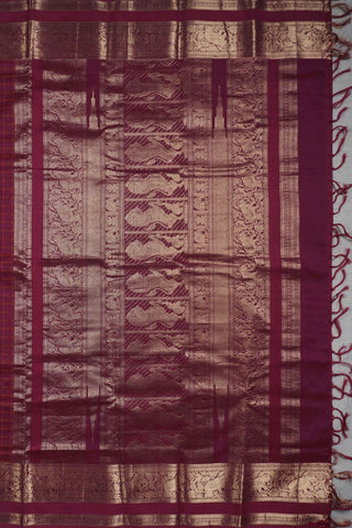 Deep magenta silk saree with mustard gold checks, antique gold elephant border and lion motif pallu