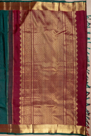 Bottle green Kanjivaram silk saree with gold zari border