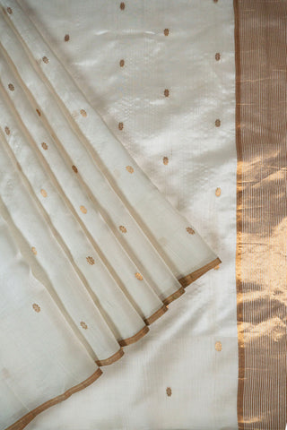 Off-white pure silk Chanderi saree with gold zari floral phool butis and tissue pallu