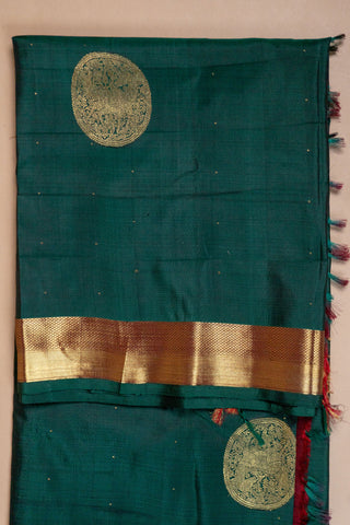 Bottle green Kanjivaram silk saree with gold zari border