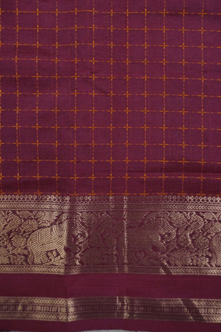 Deep magenta silk saree with mustard gold checks, antique gold elephant border and lion motif pallu
