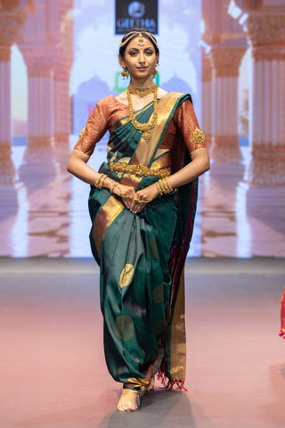 Bottle green Kanjivaram silk saree with gold zari border