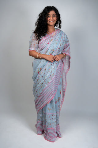 Pale blue Chanderi saree with pink striped border