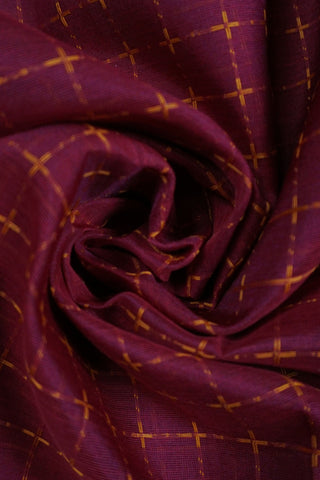 Deep magenta silk saree with mustard gold checks, antique gold elephant border and lion motif pallu