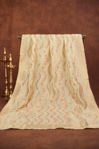 Cream Banarasi Dola silk dupatta with gold zari leheriya waves, floral meenakari dots and scalloped gold kiran lace edge