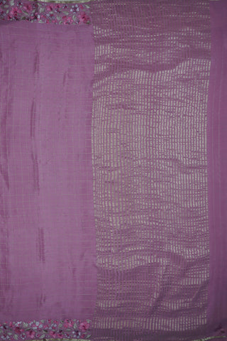 Magenta pink crepe silk saree with gold zari checks and pink-green floral thread embroidery on the pallu
