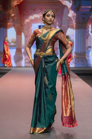 Bottle green Kanjivaram silk saree with gold zari border