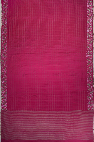 Lilac crepe silk saree with gold zari checks and pink, white and green floral vine embroidery on the borders