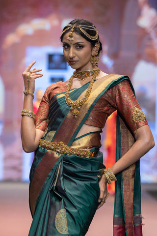 Bottle green Kanjivaram silk saree with gold zari border