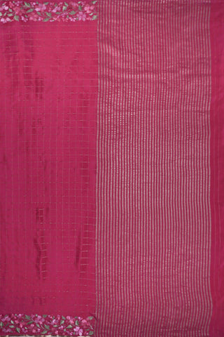 Lilac crepe silk saree with gold zari checks and pink, white and green floral vine embroidery on the borders