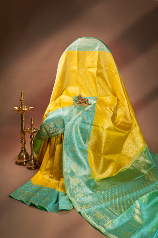 Exquisite Yellow Silk Saree with Mint Green Contrast Border