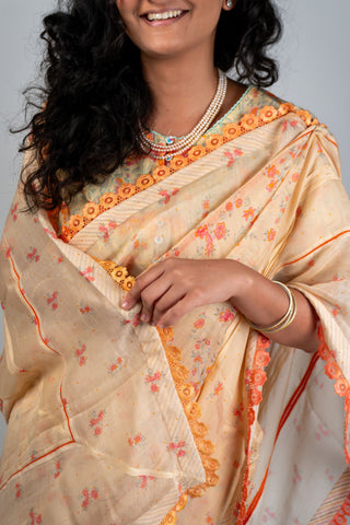 Beige Chanderi saree with peach and coral floral prints