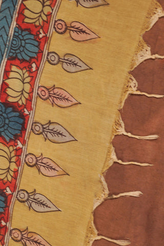 Muted mustard yellow Kalamkari dupatta with hand-drawn blue and red flowers, winding vines and rust-orange woven border