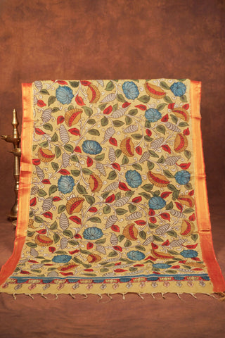 Muted mustard yellow Kalamkari dupatta with hand-drawn blue and red flowers, winding vines and rust-orange woven border