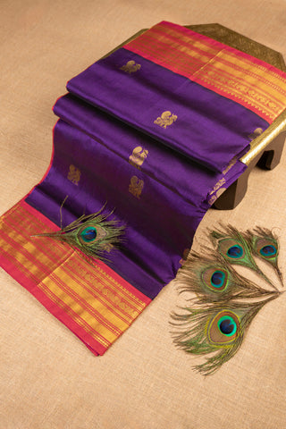 royal purple and rani pink cotton silk saree with gold zari peacock buttas handcrafted saree from Madhurya