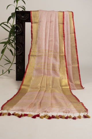 Blush pink linen saree with gold zari border and tassels