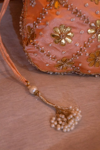 Peach Pearl Potli: Handcrafted Elegance for Celebrations